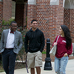 Photo of FSU students walking outside of Residence Hall